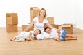 Woman with kids in their new big home Royalty Free Stock Photo