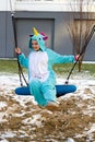 Woman in kigurumi unicorn costume Royalty Free Stock Photo