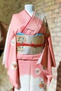Woman Kimono costume on mannequin. Traditional Japanese Maiko dress. Geisha clothing.