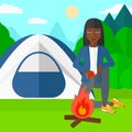 Woman kindling fire. Royalty Free Stock Photo