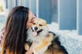 Woman kissing dog with copy space for textv Royalty Free Stock Photo
