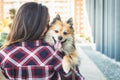 Woman kissing dog with copy space for textv Royalty Free Stock Photo