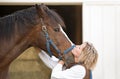 Woman Kissing Horse