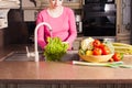 Woman in the kitchen Royalty Free Stock Photo