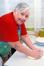 Woman kneading dough