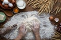 A woman kneads dough for Easter bread Royalty Free Stock Photo