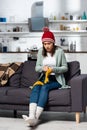 Woman in knitted hat and socks Royalty Free Stock Photo