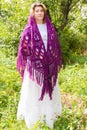 Woman in knitted shawl in nature Royalty Free Stock Photo