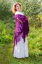 Woman in knitted shawl in nature Royalty Free Stock Photo