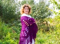 Woman in knitted shawl in nature Royalty Free Stock Photo