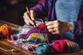 Woman Knitting Multicolored Blanket With Crochet Hook Royalty Free Stock Photo