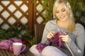 Woman knitting outdoor Royalty Free Stock Photo