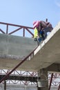 Woman labor in construction site.