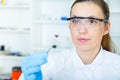 Woman laboratory assistant in the laboratory of food quality Royalty Free Stock Photo