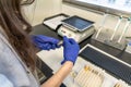 woman in laboratory doing tests for vaccine blood extraction and analytical