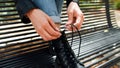 Woman Lacing Boors Laces On The Bench Royalty Free Stock Photo