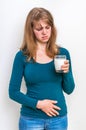 Woman with lactose problem is suffering from stomach pain Royalty Free Stock Photo