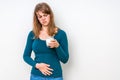 Woman with lactose problem is suffering from stomach pain