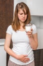 Woman with lactose problem is suffering from stomach pain