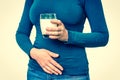 Woman with lactose problem is suffering from stomach pain Royalty Free Stock Photo