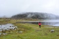 Woman at the Laguna de Mucubaji lake in Merida, Venezuela Royalty Free Stock Photo