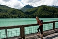 the woman on the lake of Barcis with pure and crystalline and cold waters in the province of Pordenone friuli-venezia Giulia Italy