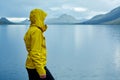 Woman on the Lake coast with mountain reflection, Iceland Royalty Free Stock Photo