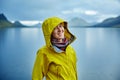 Woman on the Lake coast with mountain reflection, Iceland Royalty Free Stock Photo