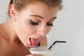 Woman lapping milk Royalty Free Stock Photo