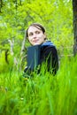 Woman with laptop in countryside Royalty Free Stock Photo