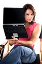 Woman With Laptop In Directors Chair
