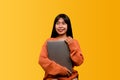 woman and laptop and are happy to work Photo of a beautiful Asian woman who is happy working at home. using a laptop Royalty Free Stock Photo