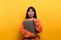 woman and laptop and are happy to work Photo of a beautiful Asian woman who is happy working at home. using a laptop Royalty Free Stock Photo