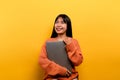 woman and laptop and are happy to work Photo of a beautiful Asian woman who is happy working at home. using a laptop Royalty Free Stock Photo