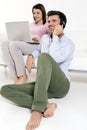 Woman with laptop and man with mobile Royalty Free Stock Photo