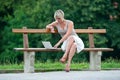 Woman with laptop outside Royalty Free Stock Photo