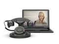 Woman on laptop screen and old rotary phone Royalty Free Stock Photo
