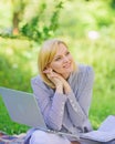 Woman with laptop sit on rug grass meadow. Online freelance career concept. Pleasant occupation. Guide starting