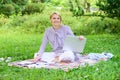 Woman with laptop sit on rug grass meadow. Steps to start freelance business. Online or freelance career ideas concept Royalty Free Stock Photo