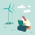 Woman with Laptop Sitting on Ground near Windmills Analysing Worldwide Situation, Reading News of Global Warming