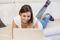 Woman laptop sofa Royalty Free Stock Photo