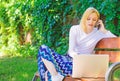 Woman with laptop works outdoor green nature background. Remote jobs browse top freelance remote work opportunities Royalty Free Stock Photo