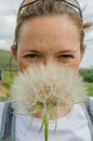 Woman with Large Dandelion Royalty Free Stock Photo