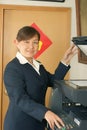 Woman and laser copier Royalty Free Stock Photo