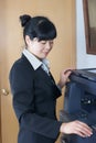 Woman and laser copier Royalty Free Stock Photo