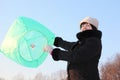 Woman in launching big baloon, half body, winter Royalty Free Stock Photo