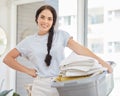 Woman, laundry basket and home portrait in lounge, room and cleaning for service, chores and smile. Happy cleaner Royalty Free Stock Photo