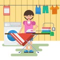 Woman in laundry is washing and ironing