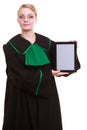 Woman lawyer attorney in classic polish gown holds tablet blank Royalty Free Stock Photo