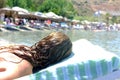 Woman is laying on beach chair Royalty Free Stock Photo